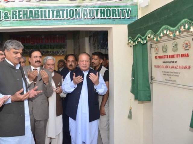 prime minister nawaz sharif offers dua after inaugurating 42 projects built by erra at bagh on september 2 2015 photo pid
