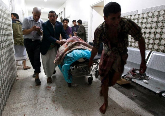 yemenis transport a severely injured man on a gurney as he arrives at a hospital in sanaa after being injured when two suicide bombers hit a shiite mosque in quick succession september 2 2015 photo afp yemenis transport a severely injured man on a gurney as he arrives at a hospital in sanaa after being injured when two suicide bombers hit a shiite mosque in quick succession september 2 2015 photo afp