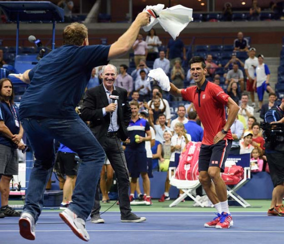 novak djokovic of serbia r dances on the court with a fan after defeating andreas haider maurer of austria during their us open 2015 second round men 039 s singles match at the usta billie jean king national center september 2 2015 in new york photo afp novak djokovic of serbia r dances on the court with a fan after defeating andreas haider maurer of austria during their us open 2015 second round men 039 s singles match at the usta billie jean king national center september 2 2015 in new york photo afp