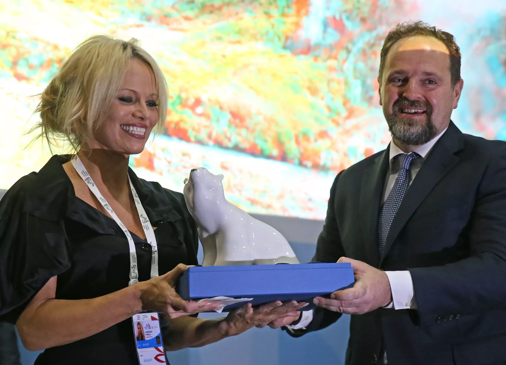 us canadian actress and animal rights activist pamela anderson l is presented with a polar bear statuette as she visits russia s first ever eastern economic forum eef in vladivostok on september 3 2015 photo afp us canadian actress and animal rights activist pamela anderson l is presented with a polar bear statuette as she visits russia s first ever eastern economic forum eef in vladivostok on september 3 2015 photo afp