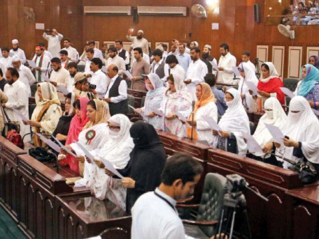 newly elected members of different tiers of the local government take oath at district council hall in the city photo ppi