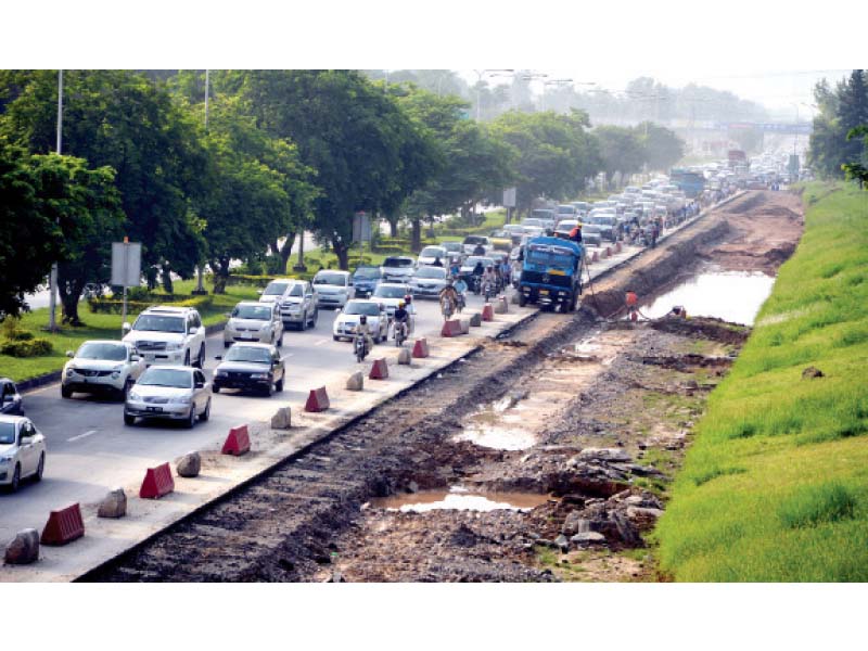 work on the islamabad expressway continues at a cost to the city s environment photo file
