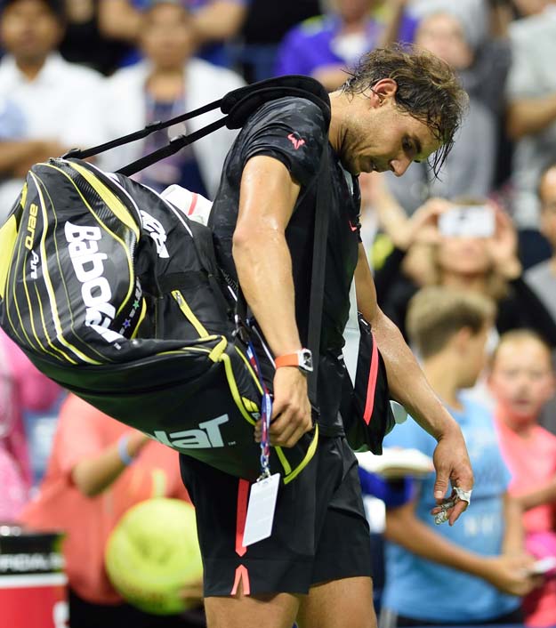 rafael nadal of spain walks off the court after being defeated by fabio fognini of italy in their 2015 us open third round men 039 s singles match at the usta billie jean king national tennis center on september 4 2015 in new york photo afp