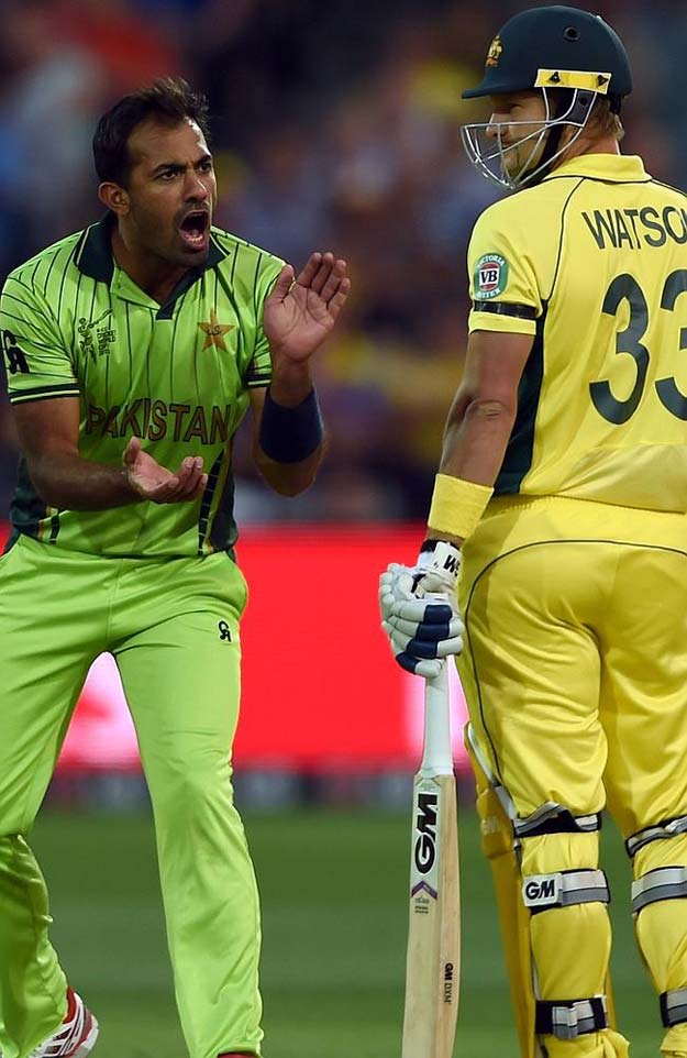 pakistani cricketer wahab riaz l reacts after bowling to australian batsman shane watson photo afp