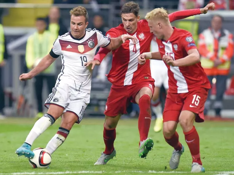 the germans exacted revenge on poland as thomas muller and mario gotze found the net to inflict a 3 1 defeat over their neighbours bia o czerwoni s first defeat in seven euro 2016 qualifiers photo afp the germans exacted revenge on poland as thomas muller and mario gotze found the net to inflict a 3 1 defeat over their neighbours bia o czerwoni s first defeat in seven euro 2016 qualifiers photo afp