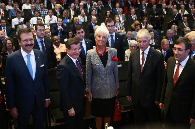 turkish prime minister ahmet davutoglu 2ndl and international monetary fund imf managing director christine lagarde c take part in the g20 finance ministers meeting in turkey on september 4 2015 in ankara photo afp