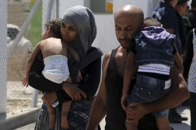 refugees arrive at the kokkinotrimithia refugee camp in cyprus september 6 2015 photo reuters refugees arrive at the kokkinotrimithia refugee camp in cyprus september 6 2015 photo reuters