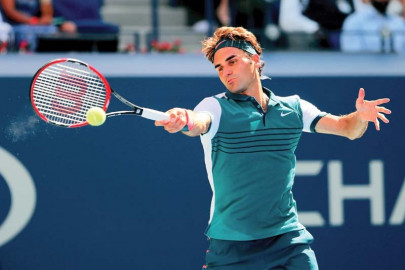 us open john isner eyes quarter final spot but must first overcome roger federer