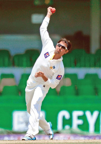 saeed ajmal earns a slot in category b despite surrendering his pakistan berth in all three formats photo afp saeed ajmal earns a slot in category b despite surrendering his pakistan berth in all three formats photo afp