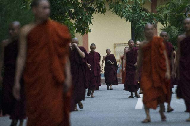 myanmar buddhist monks walk through a monastery in myanmar 039 s second biggest city mandalay on august 26 2015 photo afp