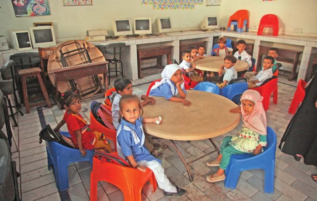 more than 20 shops have been built on all four sides of the school located on shah abdul latif bhittai road more than 20 shops have been built on all four sides of the school located on shah abdul latif bhittai road