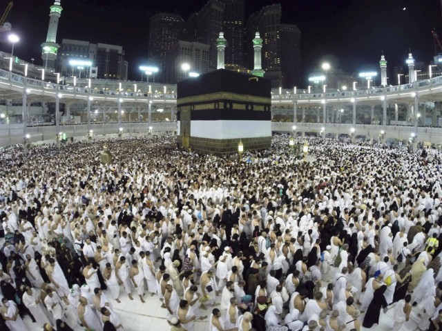 muslim pilgrims pray around holy kaaba during the annual hajj pilgrimage in makkah october 1 2014 photo afp