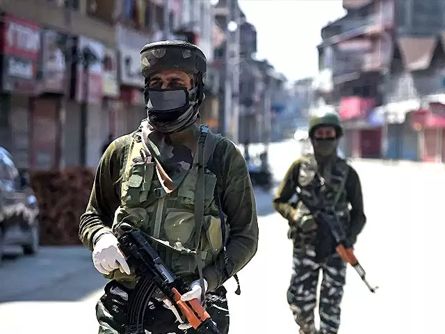 indian paramilitary forces wearing protective face masks patrol streets during the lockdown in srinagar photo getty indian paramilitary forces wearing protective face masks patrol streets during the lockdown in srinagar photo getty
