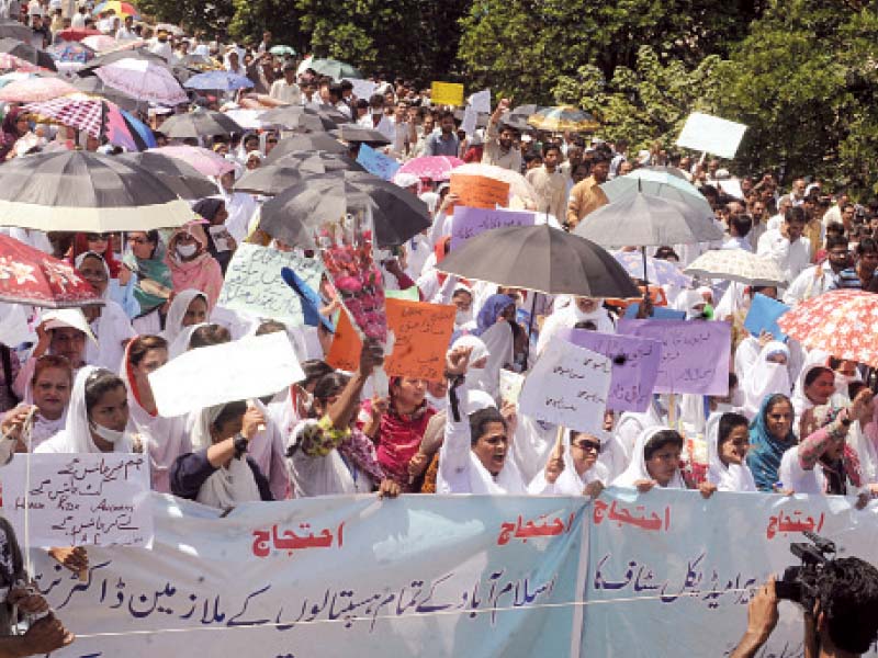 the protesters tried to enter the red zone and stage a sit in in front of the prime minister s secretariat on the constitution avenue photos waseem nazir express