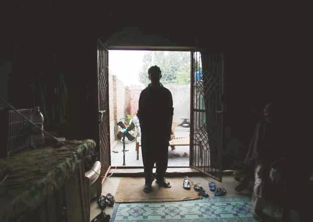 a victim of a child sex abuse scandal stands in his house in hussain khan wala town in kasur district photo reuters a victim of a child sex abuse scandal stands in his house in hussain khan wala town in kasur district photo reuters