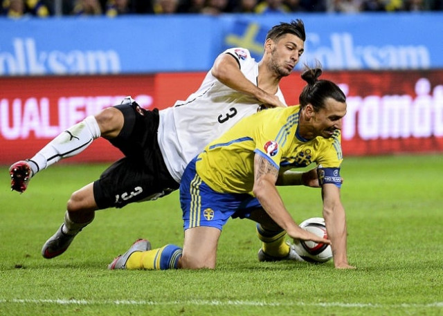 austria 039 s aleksandar dragovic and sweden 039 s zlatan ibrahimovic are seen during the euro 2016 group g qualifier in stockholm photo afp