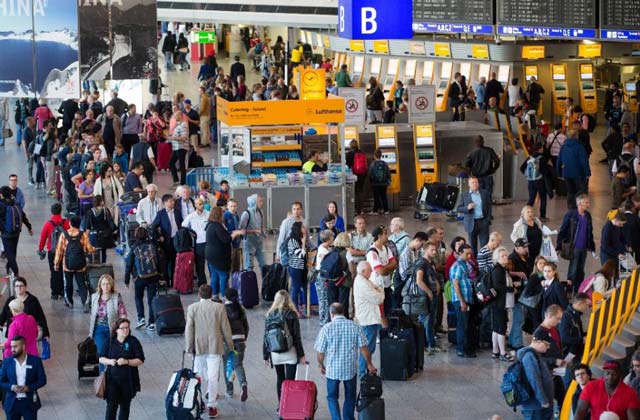 passengers wait at frankfurt airport after their lufthansa flights from frankfurt airport were cancelled on september 9 2015 photo afp
