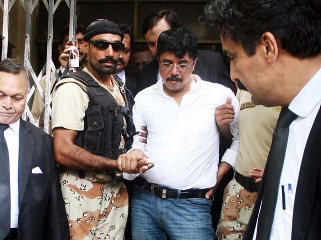 rangers personnel taking mqm leader qamar mansoor back after presenting him before an anti terrorism court on wednesday photo online