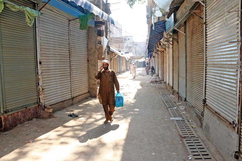 traders observe shutter down strike in qissa khwani bazaar photo express