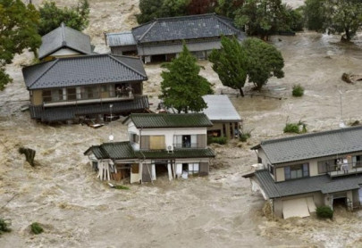 japan evacuates 100 000 in floods sparked by rare torrential rains