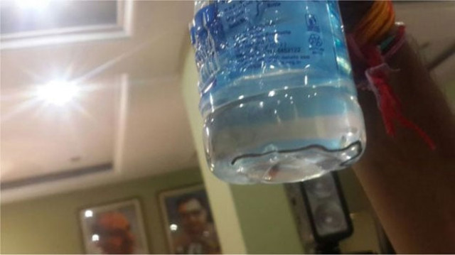 the snake was discovered in the bottle marketed as aman aqua by a doctor present at the event held at the headquarters of the ruling party bharatiya janata party bjp photo bbc the snake was discovered in the bottle marketed as aman aqua by a doctor present at the event held at the headquarters of the ruling party bharatiya janata party bjp photo bbc