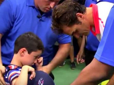 paternal instincts federer saves boy from getting crushed