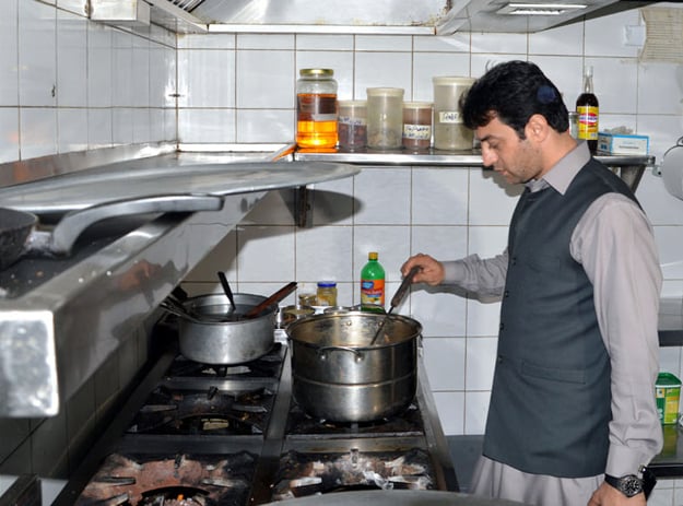 a food inspection team headed by additional deputy commissioner abus sattar esani checking the quality of kitchens at food joints photo online