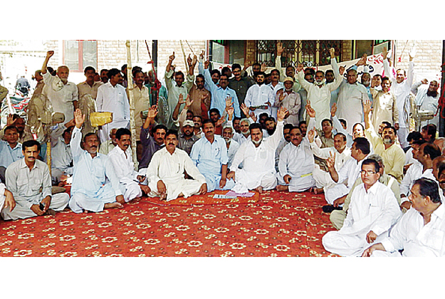 the protesters locked out the fesco headquarters and staged a sit in in front of the building photo express