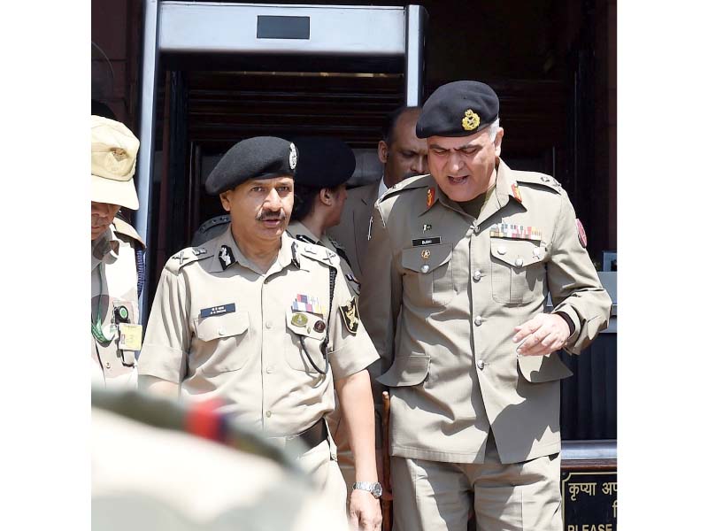 india bsf director general talks with pakistan rangers director general punjab after a meeting with indian home minister rajnath singh in new delhi photo afp