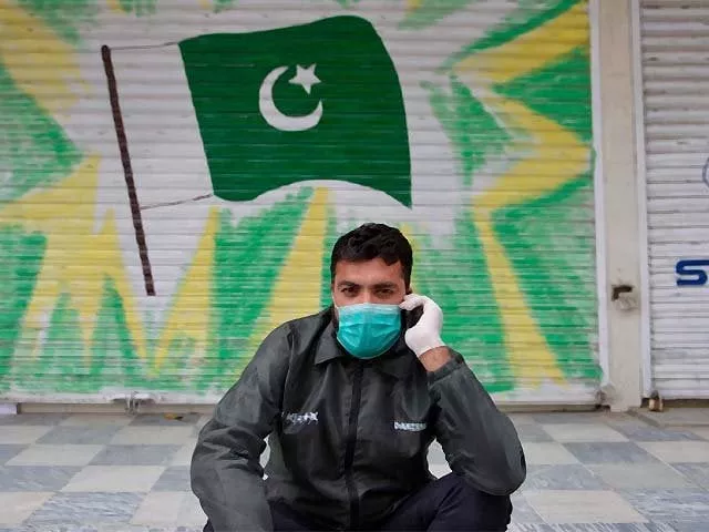 a man wearing a face mask sits in front of a shuttered market during a government imposed nationwide lockdown photo afp a man wearing a face mask sits in front of a shuttered market during a government imposed nationwide lockdown photo afp