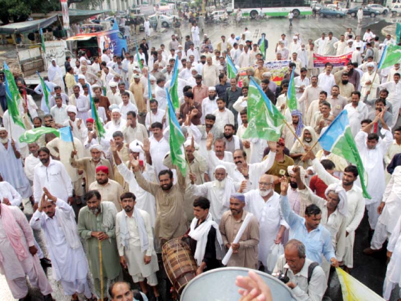 kissan board and kissan raaj party activists staged a protest demonstration at charing cross on saturday photo abid nawaz express