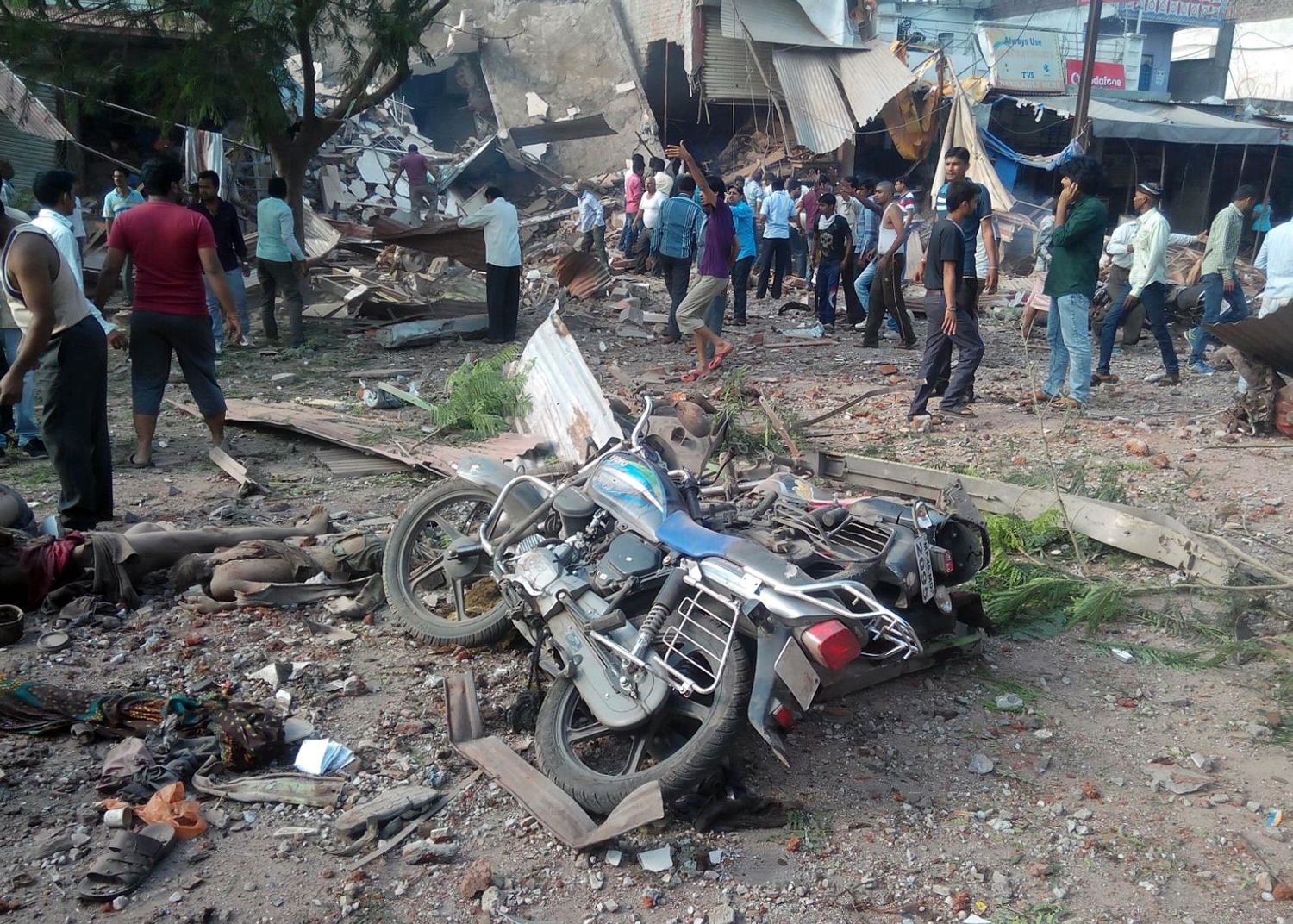 people gather around the site of an explosion at a restaurant in jhabua district in the central indian state of madhya pradesh on september 12 2015 photo afp