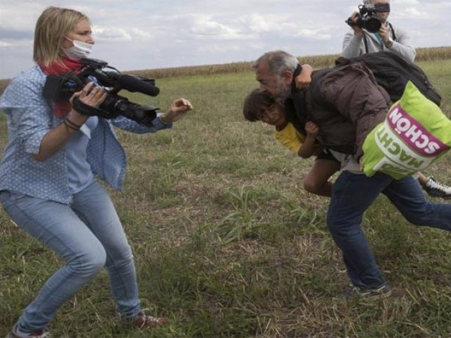 the camerawoman working for a hungarian tv news channel was reportedly fired after the video went viral photo reuters the camerawoman working for a hungarian tv news channel was reportedly fired after the video went viral photo reuters