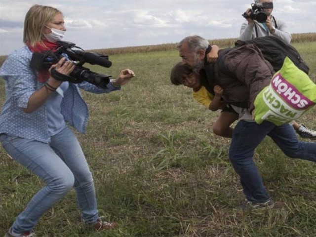 the camerawoman working for a hungarian tv news channel was reportedly fired after the video went viral photo reuters