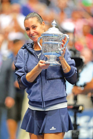 pennetta won her first grand slam singles title saturday defeating compatriot vinci 7 6 7 4 6 2 in the us open women s final before promptly announcing her retirement photo afp