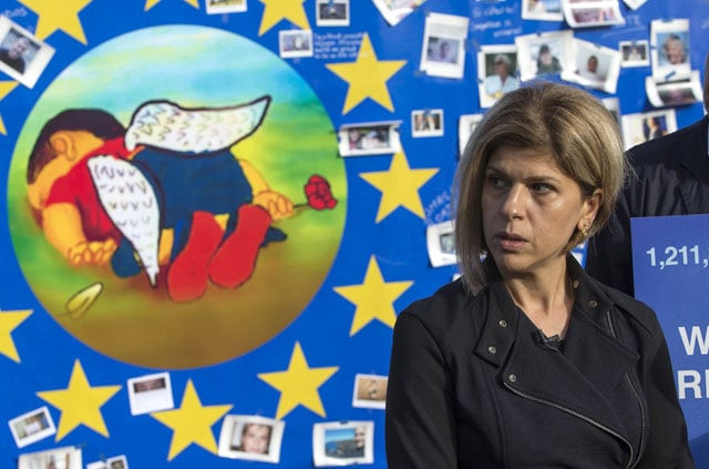 canadian tima kurdi the aunt of of three year old syrian refugee boy aylan kurdi who died trying to reach greece from turkey reacts in front of a painting depicting the drowned syrian child during a demonstration in brussels september 14 2015 photo reuters canadian tima kurdi the aunt of of three year old syrian refugee boy aylan kurdi who died trying to reach greece from turkey reacts in front of a painting depicting the drowned syrian child during a demonstration in brussels september 14 2015 photo reuters
