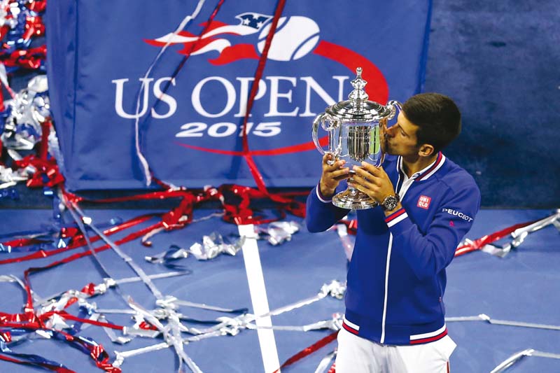 together with his australian open and wimbledon crowns djokovic matched his 2011 season by winning the same three slams photo afp