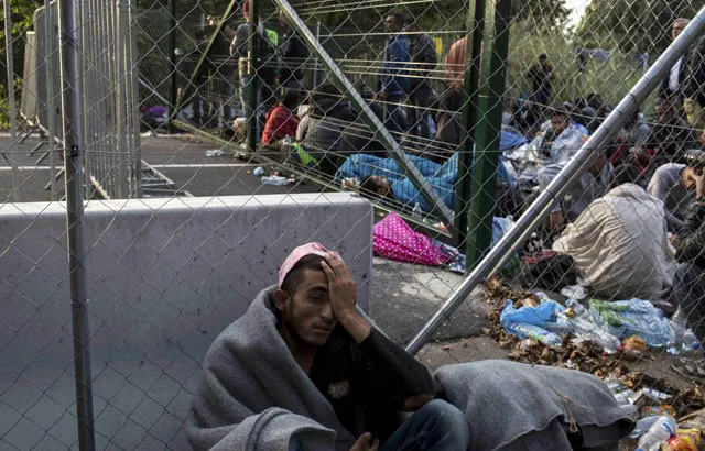 a migrant leans on a fence as he waits to enter hungary after the hungarian police sealed the border with serbia near the village of horgos serbia september 15 2015 hundreds of migrants spent the night in the open on serbia 039 s northern border with hungary their passage to western europe stalled on tuesday by a hungarian crackdown to confront the continent 039 s worst refugee crisis in two decades photo reuters a migrant leans on a fence as he waits to enter hungary after the hungarian police sealed the border with serbia near the village of horgos serbia september 15 2015 hundreds of migrants spent the night in the open on serbia 039 s northern border with hungary their passage to western europe stalled on tuesday by a hungarian crackdown to confront the continent 039 s worst refugee crisis in two decades photo reuters