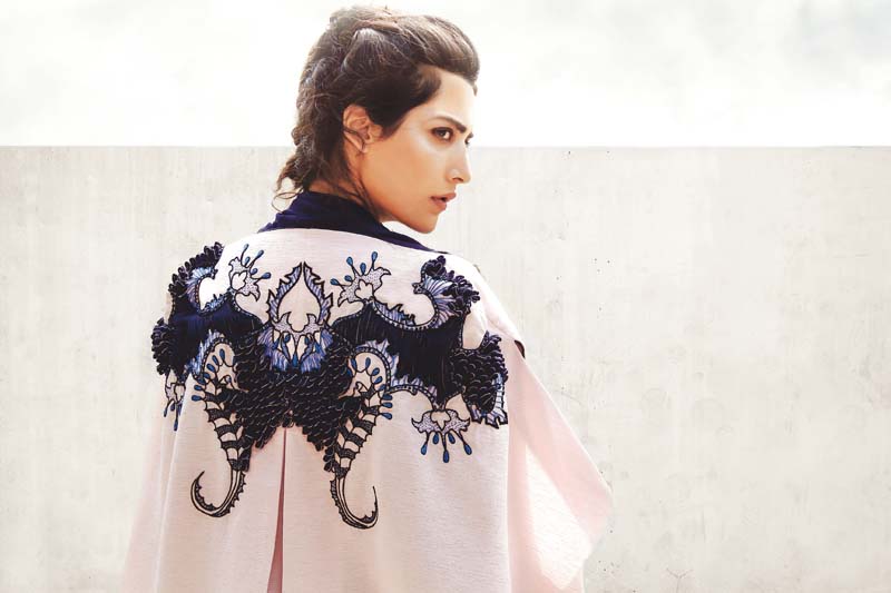 malik has used embroidered motifs such as keys spider webs and samurai armour in his collection photos publicity