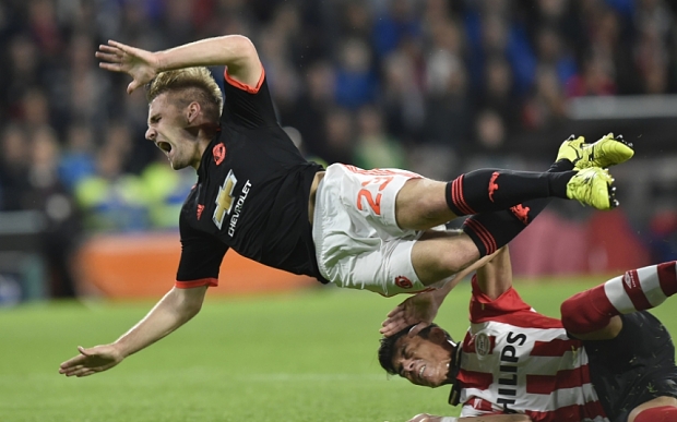 manchester united 039 s luke shaw suffers a double fracture against psv photo afp