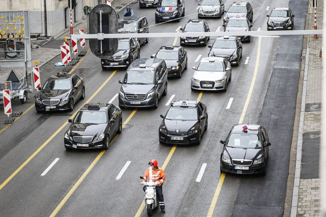 taxi drivers use their vehicles to block a street during a protest in brussels on september 16 2015 against us based ride hailing company uber several of the city 039 s main roads including access roads to the airport were blocked as taxi drivers took to the streets of brussels to protest against the us based ride hailing company uber photo afp taxi drivers use their vehicles to block a street during a protest in brussels on september 16 2015 against us based ride hailing company uber several of the city 039 s main roads including access roads to the airport were blocked as taxi drivers took to the streets of brussels to protest against the us based ride hailing company uber photo afp