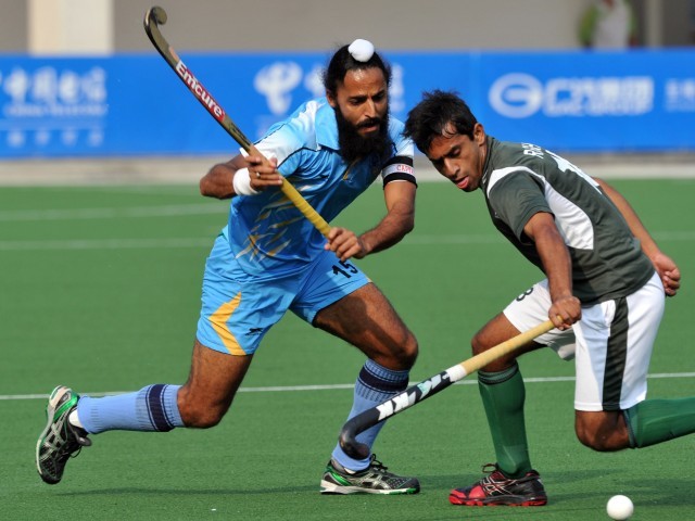 pakistani and indian players vie for the ball photo afp