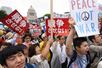 japan takes key step to passage of security bills despite protests