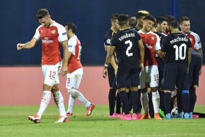 zagreb stun arsenal as roma hold barca to draw zagreb stun arsenal as roma hold barca to draw