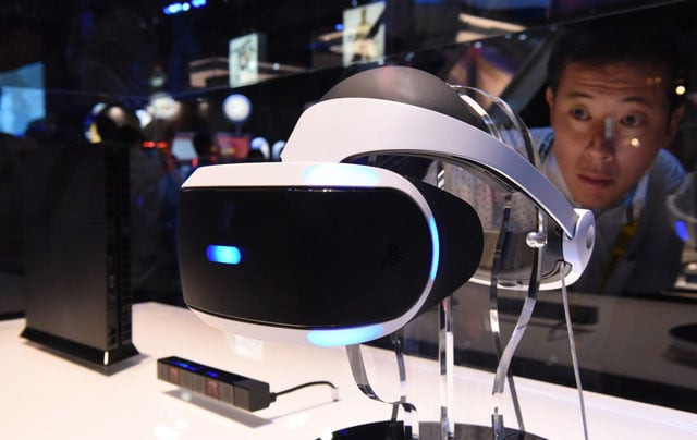 a man looks at sony 039 s virtual reality head gear quot playstation vr quot during the tokyo game show in chiba a suburb of tokyo on september 17 2015 photo afp a man looks at sony 039 s virtual reality head gear quot playstation vr quot during the tokyo game show in chiba a suburb of tokyo on september 17 2015 photo afp