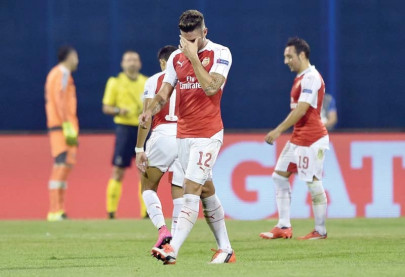 champions league giroud send off very harsh says a riled wenger champions league giroud send off very harsh says a riled wenger