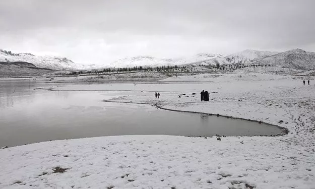 a general view of people visiting the snow covered hanna lake after a snowfall photo reuters a general view of people visiting the snow covered hanna lake after a snowfall photo reuters