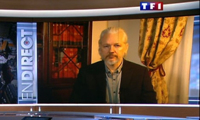 assange says french president stabbed me in back