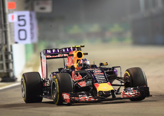 red bull driver daniil kvyat of russia takes a corner during the practice session of the formula one singapore grand prix in singapore on september 18 2015 afp