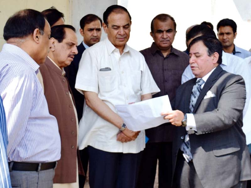 chaudhry was briefed by senior officials on the progress of the new building photo express